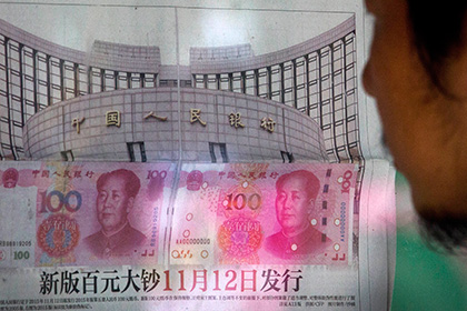 Центробанк Китая девальвировал юань
