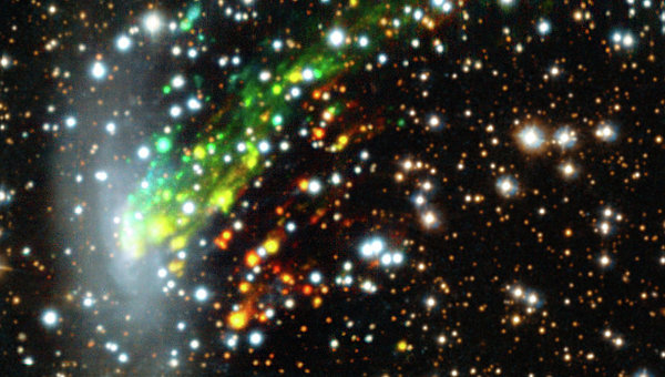 Ученым удалось заснять космическую катастрофу в спиральной галактике