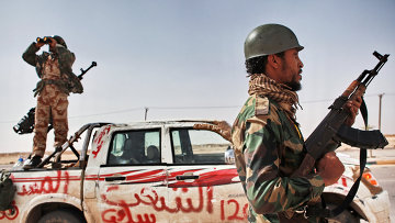 Войска Каддафи приблизились к стратегически важному городу Адждабия