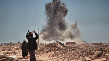 Силы Каддафи обстреливают город Адждабия на востоке Ливии