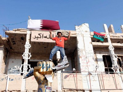 Мародеры в Триполи грабят особняки детей Каддафи