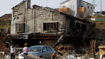 Число жертв землетрясения и цунами в Японии превысило 13,5 тысяч